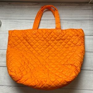 Bright Orange quilted tote bag puffer style paisley lined interior zipper pocket